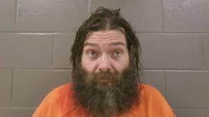 Bowling Green man accused of attacking 61-year-old roommate with a baseball  bat and sword