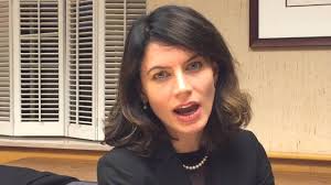 Former Swansea mayor sues village