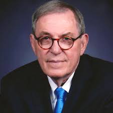 Aiken's Dr. John Bradley: It Took a Village -