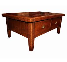 The top is secured to the raw steel hairpin table legs by solid cherry blocks attached to the top. Howard Solid Cherry Wood Coffee Table With Through Drawers Settle Home