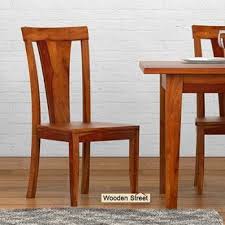Buy Sofie Dining Chair With Honey Finish Online From Wooden Street Explore Out A Broad Range Of Dining Chairs Luxury Dining Chair Solid Wood Dining Chairs