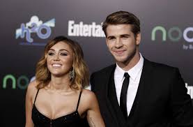 This is my first work on devianart and i hope you like it. The Hunger Games Premiere Red Carpet Fashion Miley Cyrus Liam Hemsworth And More Mlive Com