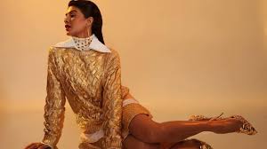 Jacqueline Fernandez in sweater and mini skirt favours gold for a new  shoot: Yay or Nay? | Hindustan Times