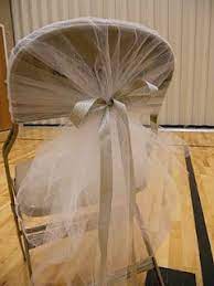 Maybe you would like to learn more about one of these? Diy Tulle Chair Covers Could Hopefully Cover All Chairs For Under Fifty Bucks Buychair Bridal Shower Chair Wedding Chair Decorations Diy Chair Decorations