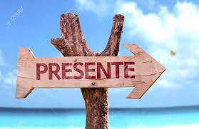 Signo De Presente (presente En Portugués) Con La Flecha En El Fondo De La  Playa Fotos, retratos, imágenes y fotografía de archivo libres de derecho.  Image 62373929