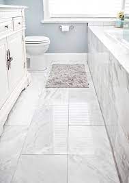 A black floor tile, white wall tile and shimmery accent tile are a winning combination. 50 Cool Bathroom Floor Tiles Ideas You Should Try Digsdigs
