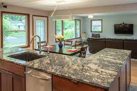 The open kitchen is a popular concept in small apartments and augments the overall spacious look of the entire area. How To Create An Open Concept Floor Plan In An Existing Home Degnan Design Build Remodel