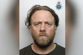 Masked dad, 41, at 'forefront' of Hanley riots served in Iraq