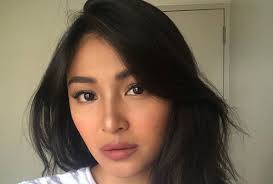 According to nadine, the rose on her wrist is an act of giving herself a flower every time she struggles in loving herself. Nadine Lustre Loses Mobile Phone In Brazil The Filipino Times