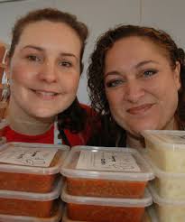 SOUL FOOD: Bellyful Porirua organisers Rebecca Morahan, left, and Tracie Lane, with piles of ready-made meals prepared for new mums in need. - 5267632