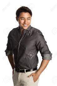 Cool Laid Back Man Wearing A Grey Shirt With Rolled Up Sleeves And Khaki Pants Standing With A Big Smile Against A White Background Stock Photo Picture And Royalty Free Image Image