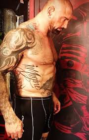 Check out what he thought of the tattoos belonging to wwe icon. Untold Stories And Meanings Behind Dave Bautista S Tattoos Tattoo Me Now