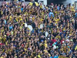 The name peñarol comes from the peñarol neighbourhood on the outskirts of montevideo. Penarol Fans Picture Of Fanaticos Futbol Tours Montevideo Tripadvisor