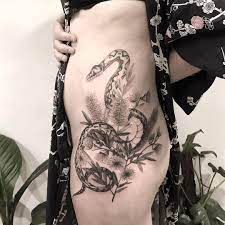The Hanged Snake Tattoo Tattoos Snake Tattoo Native Australian Flowers