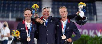 The french men's foil team made up of enzo lefort, erwann le pechoux, julien mertine and maxime pauty were celebrating their gold medal. Qgqifvexeo Ujm