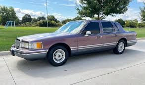 Image result for Light Cypress 1997 Town Car