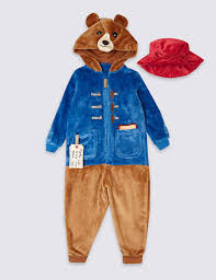 He first appeared on 13 october 1958 in the children's book a bear called paddington and has been featured in more than twenty books written by british author michael bond and illustrated by peggy fortnum and other artists. Paddington Onesie 9 Months 7 Years M S