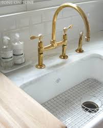 Another important kitchen fixture is the faucet. Tone On Tone Brass Kitchen Faucet Gold Bathroom Faucet Brass Kitchen