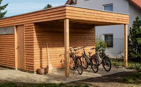 Www Neuberga Com Fahrradschuppen Unterstand Gartenhaus Gerateschuppen Flachdach Dachbegrunung Larchenholz Modern Gartenhaus Haus Gerateschuppen Bauen