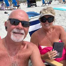 What is the best beach in Hilton Head Island for families with kids,  considering parking, showers, and nearby food options?