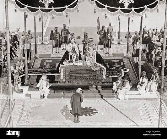 The Nizam of Haidarabad pays homage to King George V and Queen Mary at the 1911 Delhi Durbar, Coronation Park, India. George V, 1865 – 1936. King of the United Kingdom and
