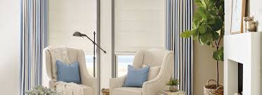 Roman shades are different from standard window shade in that they stack up evenly when being opened; Design Studio Custom Fabric Roman Shades Hunter Douglas