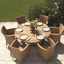 Round dining table with a leaf. Royal Teak Collection 60 Wide Round Drop Leaf Dining Table Rldlt5