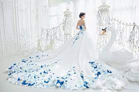 This Beautiful Gown From Abineri Designs Featuring Unique Blue Butterflies Is A Show Stopper Butterfly Wedding Dress Blue Wedding Dress Royal Wedding Dress Patterns