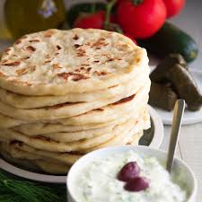 Combine 1 cup lukewarm water in a large mixing bowl with yeast and sugar. Greek Pita Bread Recipe Easy And Tasty Philosokitchen