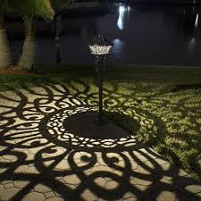 Out Door Lighting Fixture Makes A Beautiful Shade On The Ground Landscape Lighting Design Solar Lights Garden Landscape Lighting