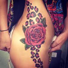 Black ink cheetah tattoo idea for girls. 12 Seductive Animal Print Tattoos To Show Your Wildest Side Leopard Print Tattoos Tattoos Cheetah Print Tattoos