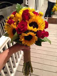 Fall weddings are so romantic and the change of season has us all smitten. Sunflower And Red Rose Bouquet My Bouquet Red Bouquet Wedding Red Rose Bouquet Red Roses And Sunflowers