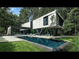 Completed In 2019 In Rosengarten Germany Images By Frank Loschke Like A Sculpture Carved Out Of Stone The Concrete Architecture House Exterior Architecture