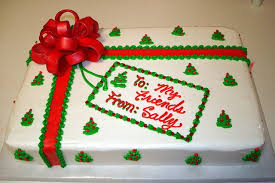 The christmas cake is designed to look like a christmas tree complete with a mistletoe and christmas balls hanging around the tree. Pin By Teresa Dressler On Christmas Creations Christmas Birthday Cake Christmas Cake Christmas Cake Designs