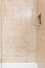 2x6 Sand Dune Tiles Cover These Shower Walls Brown Tile Bathroom Bathroom Inspiration White Bathroom Interior
