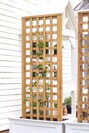 Attach the 2×2 supports to the back of the planter. Diy Trellis Planter Love Grows Wild
