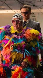 To Think Coling Firth Fried On Elton S Costume Someone Please Release Those Pictures Elton John Costume Kingsman Elton John