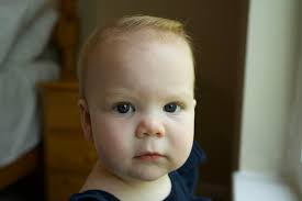 Hi, can anyone please remove the pink light effects so there's a clearer  view of the face? I want to use it as a reference photo for a painting.  Thanks so much!