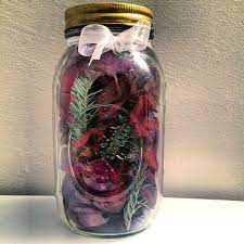 Dried Roses And Christmas Tree Needles Stuffed In A Mason Jar Make For A Wonderful Smelling Potpourri Display In Flowers In Jars Drying Roses Potpourri Display