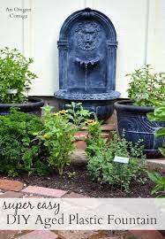 Garden hose nozzles, garden hose wands, outdoor faucet covers Diy Aged Fountain How To Age Faux Stone An Oregon Cottage Diy Fountain Faux Stone Garden Fountain