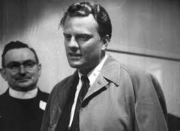 Billy graham's message has never changed, and it never will. Evangelist Billy Graham Arrives For 11 Day Crusade Nzhistory New Zealand History Online