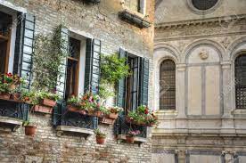 Window boxes can completely transform the facade of your house. Flower Boxes Below A Window In Venice Italy Stock Photo Picture And Royalty Free Image Image 18210603