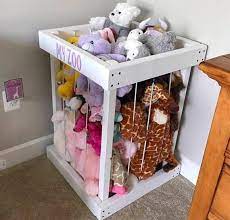 Zoos En Bois Animaux En Peluche Sont La Reponse Pour La Chambre En Desordre Fait Avec Tendeurs Pour Toy Storage Kids Room Storage Kids Room Baby Toy Storage