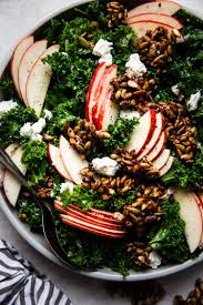 Kale Salad With Apples And Pumpkin Seed Clusters The Modern Proper Recipe In 2020 Kale Salad Food Healthy Recipes
