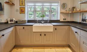 Wide selection of colours, such as dove grey, graphite, hartforth blue, partridge grey, porcelain and stone, are available from stock. Mid Grey Shaker Kitchen Chidingfold Kitchens
