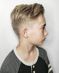 Side parting with a faded hairstyle. The 22 Best Haircuts For Teenage Boys For 2021