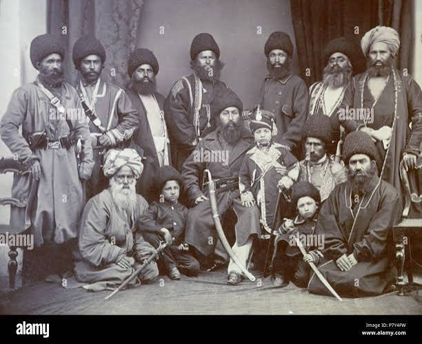 Group of the Amir Shere Ali with Prince Abdullah, Nasher Khan & Pashtun Sardars. Photograph taken by John Burke in 1869; a studio portrait of the Amir of Afghanistan, Sher Ali (1825-1879),