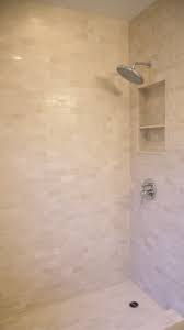 Crema Ella Agora S Beloved Soft Cream Color Marble Here In A Shower Installation In 3 X 6 Subway Tile Format Cream Tile Bathroom Bathroom Colors Cream Tile