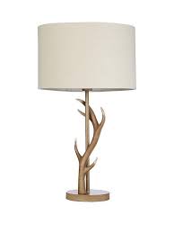The rectangle semi drum shade is a sueded chocolate textile.… Antler Table Lamp Very Co Uk