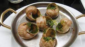 Place 1 snail along with some sauce in each cup of an escargot pan. How To Clean And Prepare Fresh Snails For Cooking
